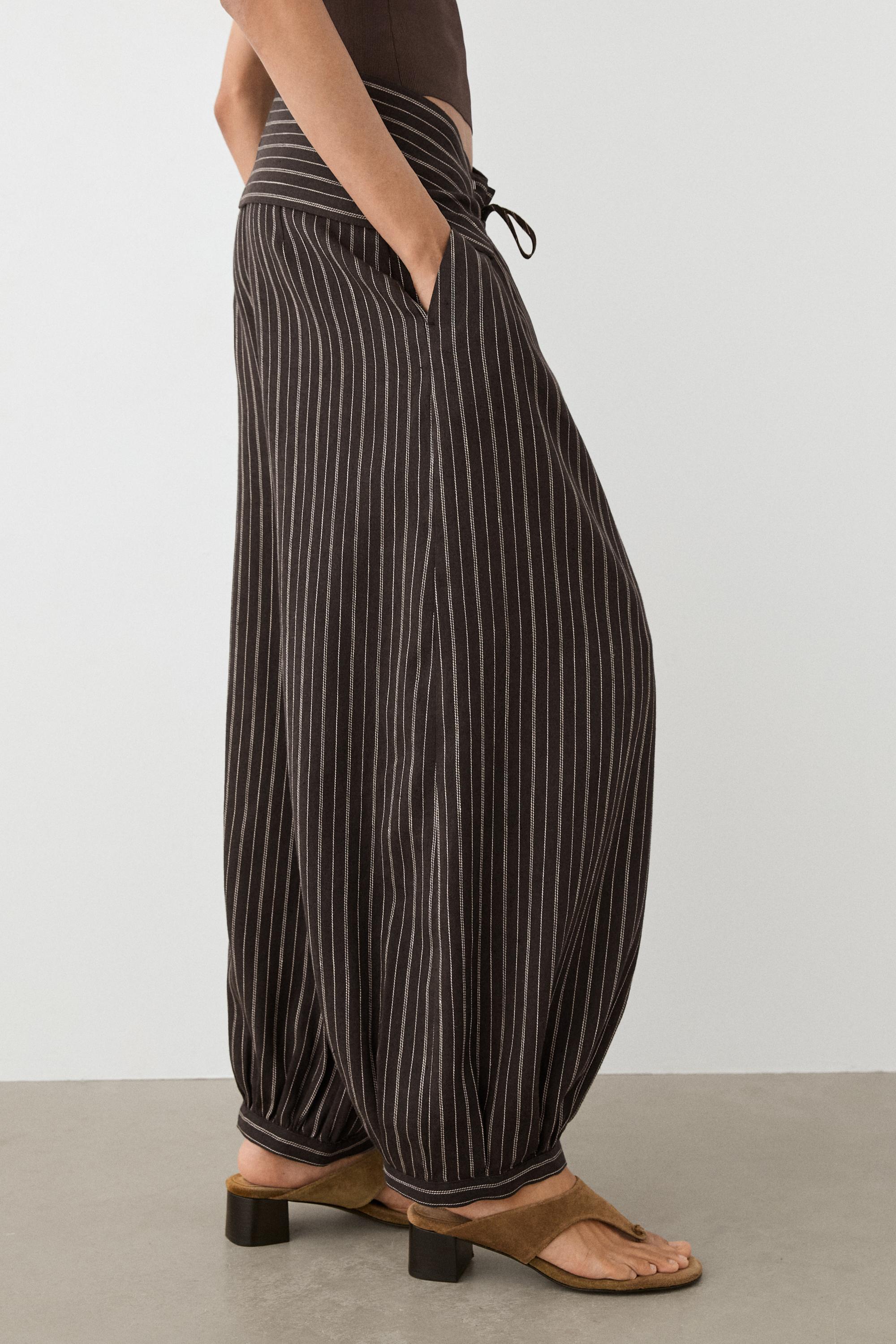 Striped sarouel trousers with cummerbund detail